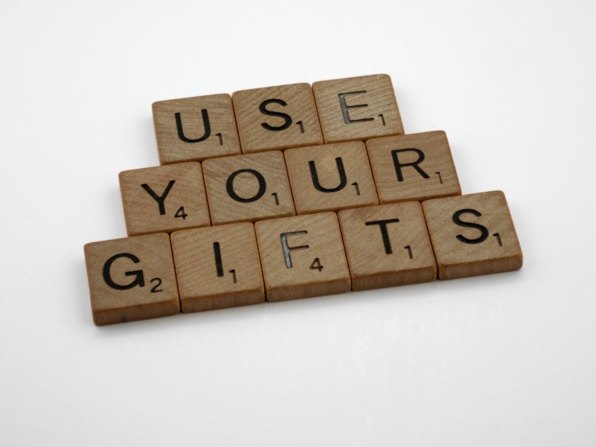 Wooden letter tiles spelling Use Your Gifts