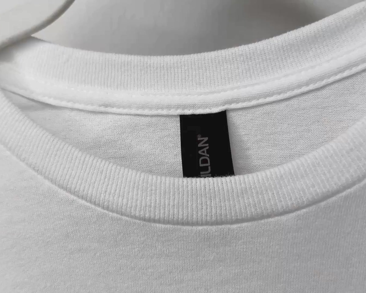 Close-up view of Gildan 64000 Softstyle T-shirt fabric, stitching, and garment details